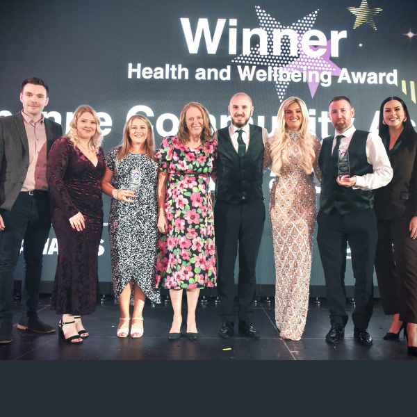 Group photograph celebrating the Health and Wellbeing Award winners at the ABC Community Awards 2026, sponsored by Tarasis Enterprises.